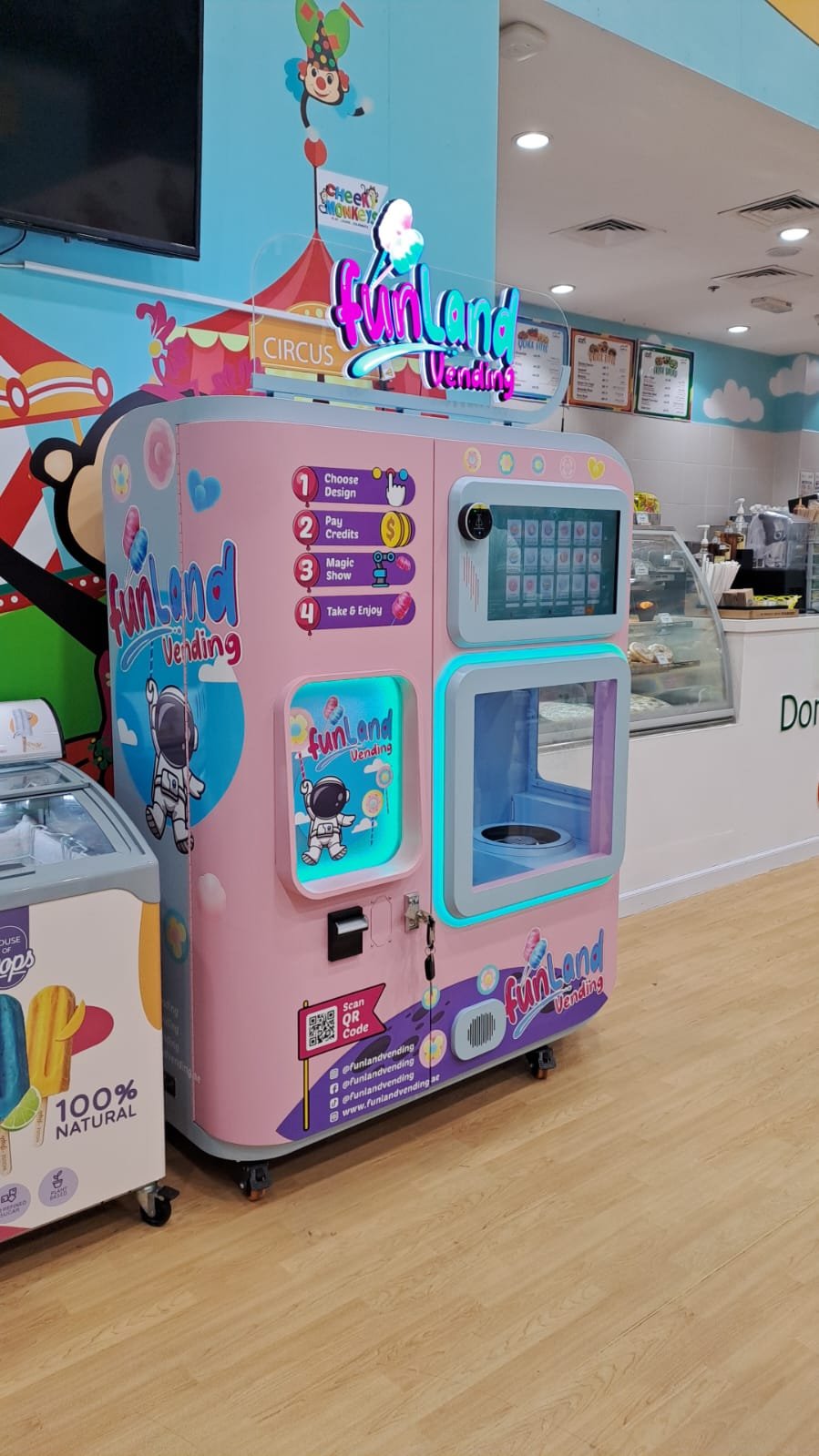 Front view of a Funland Vending fully-automated cotton candy machine
